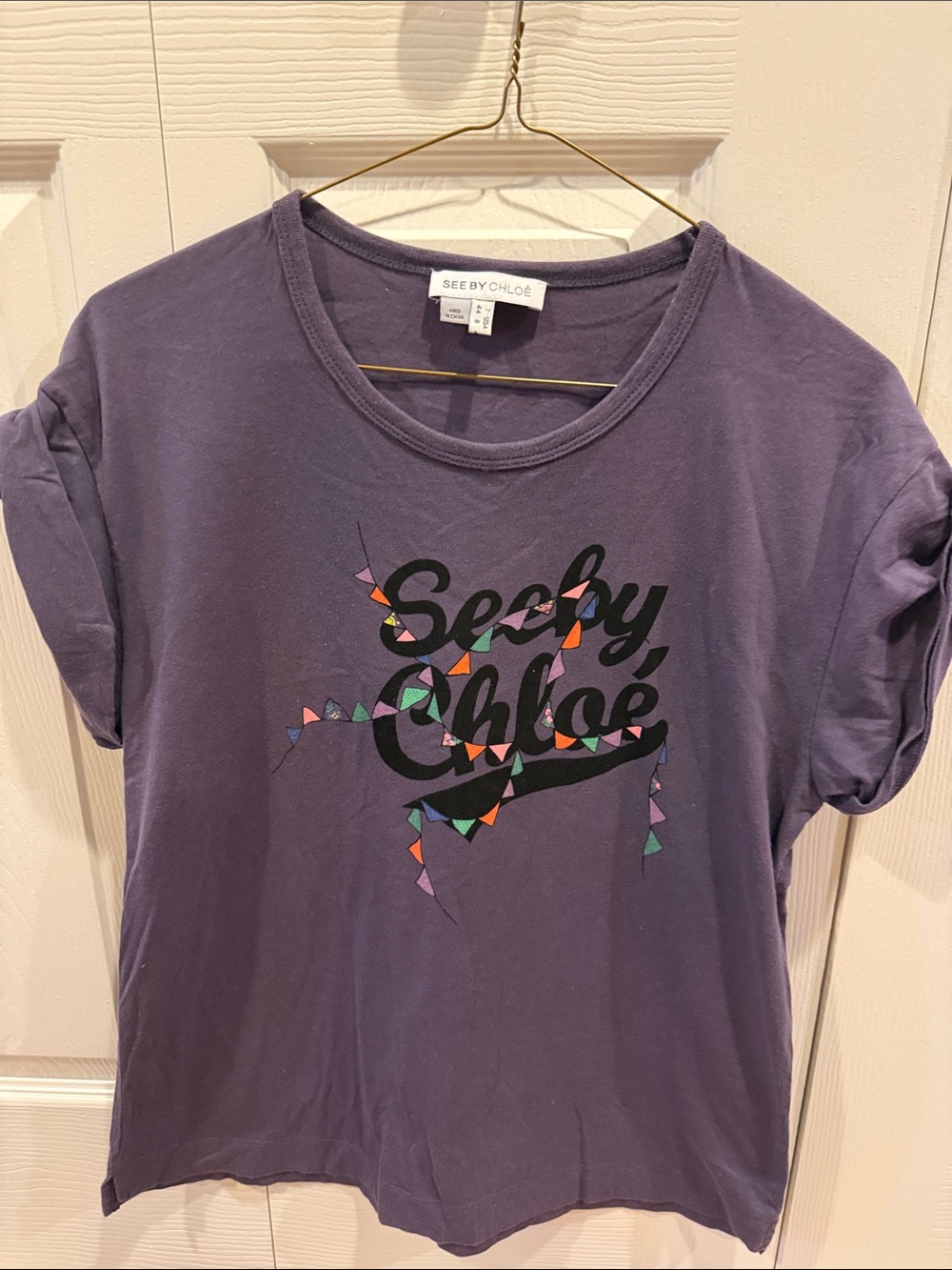 See By Chloe Purple Tee with Black Logo and Multicolor Accents.. USA size 8 or M